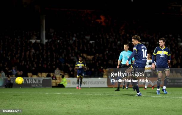 Morgan Rogers of Middlesbrough scores their sides second goal during the Carabao Cup Quarter Final match between Port Vale and Middlesbrough at Vale...