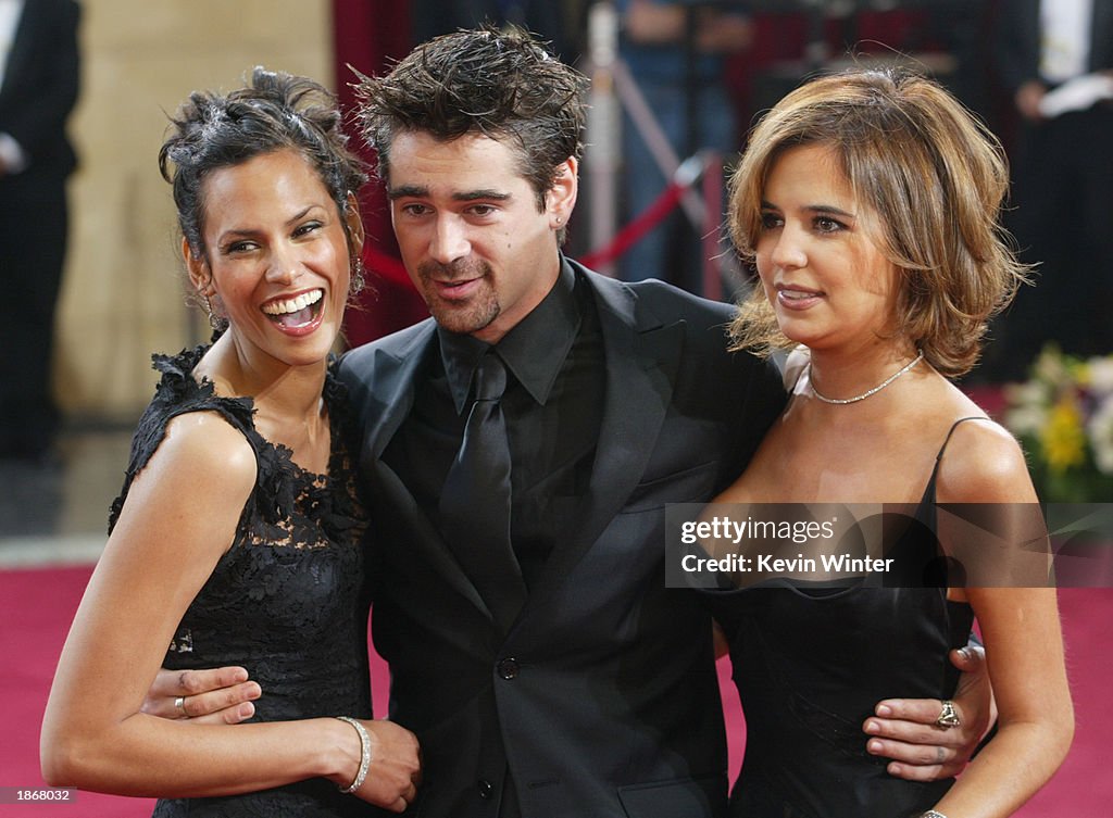 Model Kim Bordenave, Colin Farrell and his sister Claudine attend the