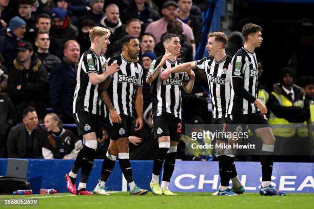 Callum Wilson of Newcastle United celebrates with team mates after scoring their sides first goal during the Carabao Cup Quarter Final match between...