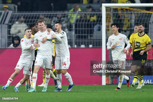 Sepp van den Berg of Mainz celebrates the first goal with his team mates during the Bundesliga match between Borussia Dortmund and 1. FSV Mainz 05 at...
