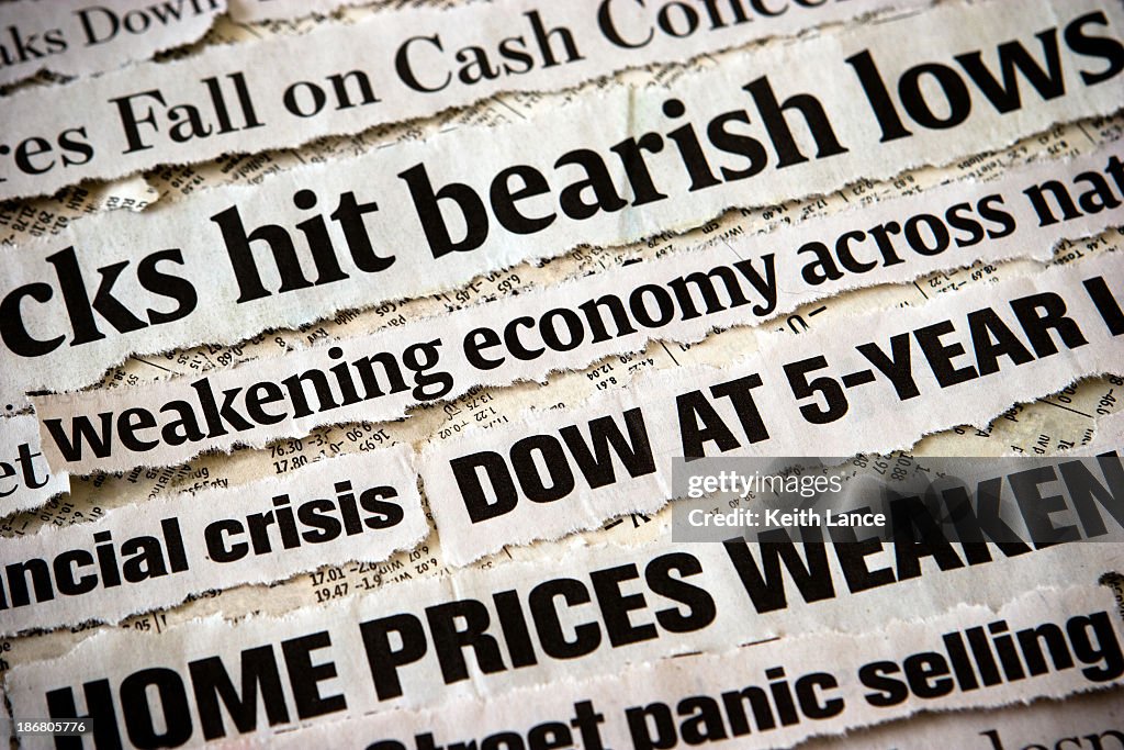 Economic headlines surrounding each other