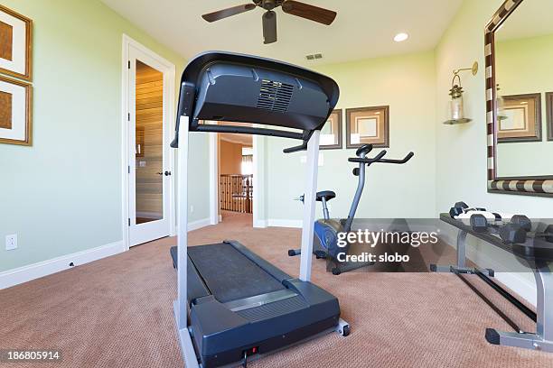 fitness room - exercise room stock pictures, royalty-free photos & images