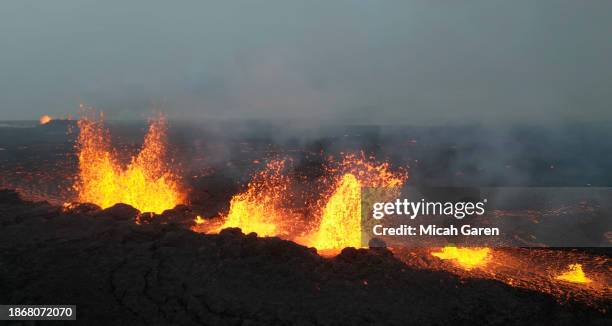 Lava is spewing from a volcano that erupted on Reykjanes peninsula on December 19, 2023 in Grindavik, Iceland. After weeks of seismic activity around...