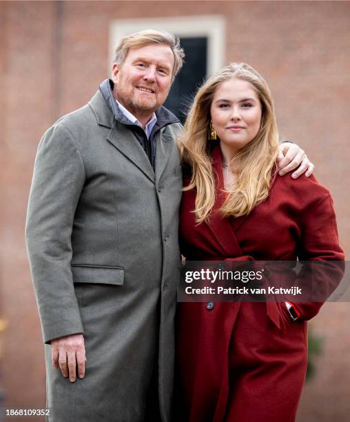 King Willem-Alexander of The Netherlands and Princess Amalia of The Netherlands during a photo session at Palace Huis ten Bosch on December 22, 2023...