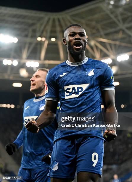 Ihlas Bebou of TSG 1899 Hoffenheim celebrates scoring their team's third goal during the Bundesliga match between TSG Hoffenheim and SV Darmstadt 98...