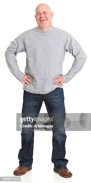 laughing standing man - gray jeans stockfoto's en -beelden