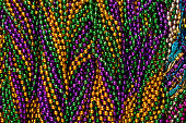 Close-up background of Mardi Gras beads
