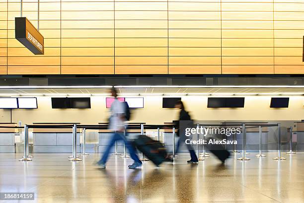 people traveling - airport check in counter stock pictures, royalty-free photos & images