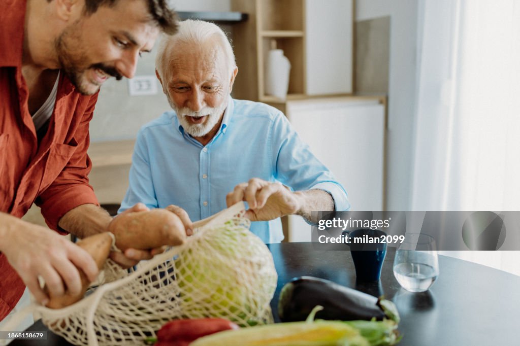 Son helping his father