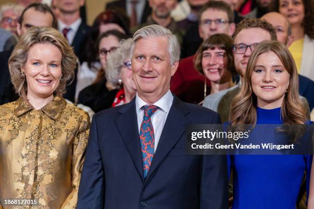 Queen Mathilde of Belgium, King Philippe of Belgium and Princess Elisabeth of Belgium host a reception for one hundred members of the public during...