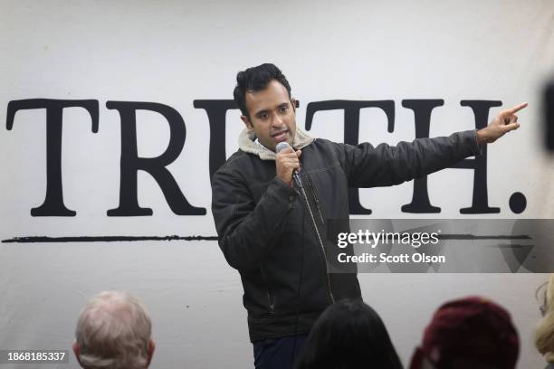 Republican presidential candidate businessman Vivek Ramaswamy speaks to guests during a campaign stop at the AmericInn on December 19, 2023 in...