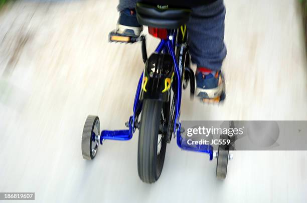 bicycle - training wheels stock pictures, royalty-free photos & images