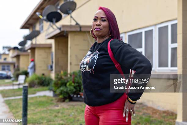 Los Angeles, CA Janie Jones who has lived Nickerson Gardens housing projects since she was 6-years -old poses for a portrait before Top Dawg...