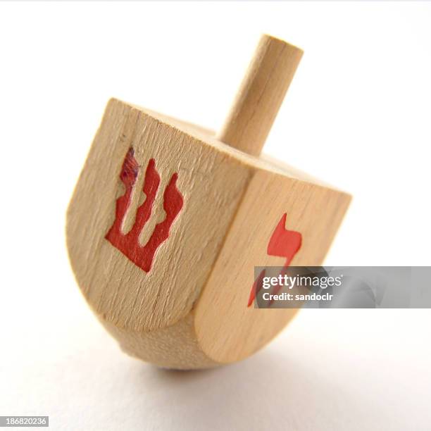 wood dreidel - dreidel stock pictures, royalty-free photos & images