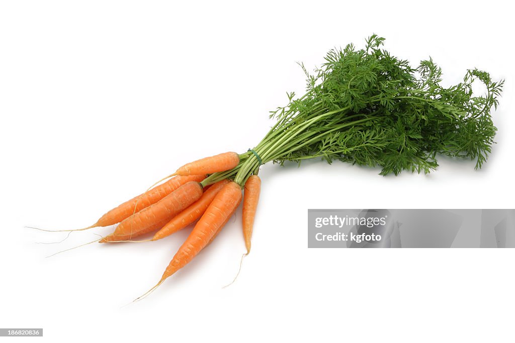 Bundle of small carrots on white background