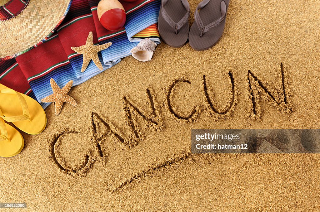 Cancun beach writing