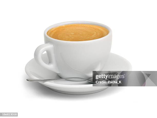 a cup of coffee with a spoon and saucer - cappuccino stock pictures, royalty-free photos & images