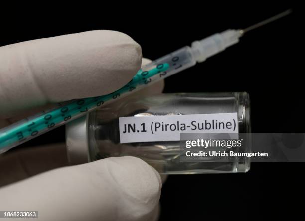 This photo illustration shows an original vaccination vial labeles JN.1 Pirola subline on Decembetr 22, 20243 in Bonn, Germany. A new variant of the...