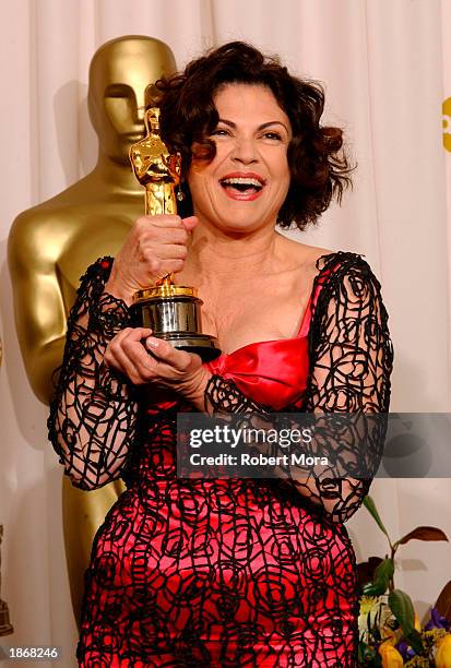 Designer Colleen Atwood poses with her Achievement In Costume Design award for "Chicago" backstage during the 75th Annual Academy Awards at the Kodak...