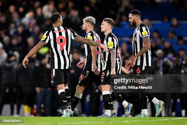 Kieran Trippier of Newcastle United is consoled by Callum Wilson of Newcastle United after missing their sides penalty during a penalty shoot out in...