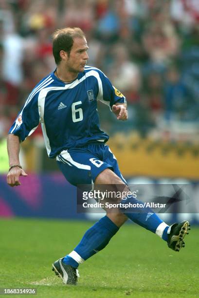 June 12: Angelos Basinas of Greece passing the ball during the UEFA Euro 2004 match between Portugal and Greece at Estadio Do Dragao on June 12, 2004...