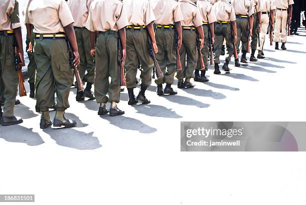 troops or soldiers marching in line - steel toe stock pictures, royalty-free photos & images