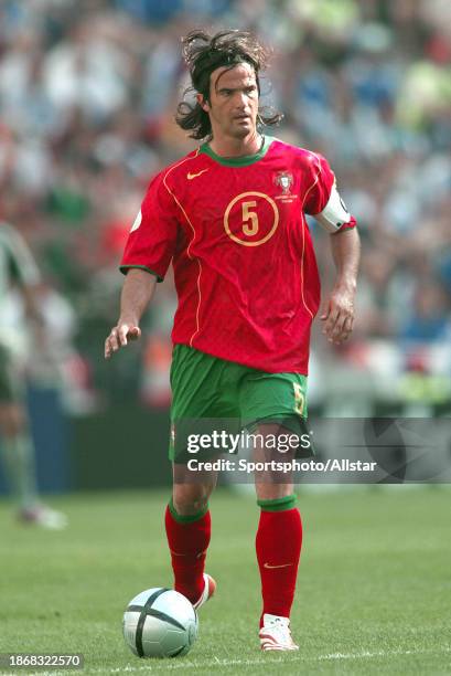 June 12: Fernando Couto of Portugal on the ball during the UEFA Euro 2004 match between Portugal and Greece at Estadio Do Dragao on June 12, 2004 in...