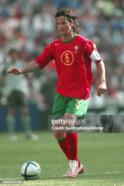 June 12: Fernando Couto of Portugal on the ball during the UEFA Euro 2004 match between Portugal and Greece at Estadio Do Dragao on June 12, 2004 in...