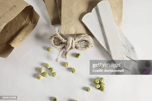 pea seeds - seed packet stock pictures, royalty-free photos & images