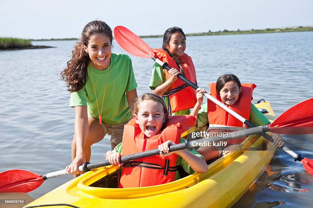 Girls in a double kayak