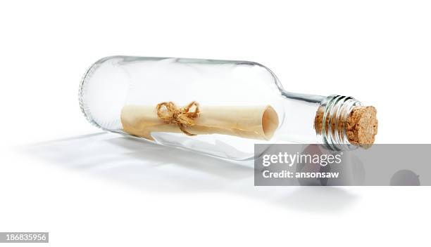 message in a bottle - message in a bottle stock pictures, royalty-free photos & images