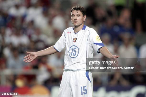 June 12: Dmitri Alenichev of Russia in action during the UEFA Euro 2004 match between Spain and Russia at Estadio Faro-loule on June 12, 2004 in...