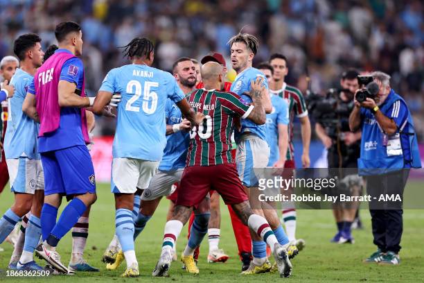 Kyle Walker and Jack Grealish of Manchester City clash with Felipe Melo of Fluminense after the FIFA Club World Cup Saudi Arabia 2023 Final match...