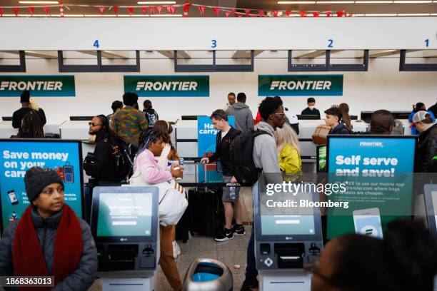 Frontier Check In 1,319 Frontier Airlines Stock Photos, High-Res Pictures, and Images ...