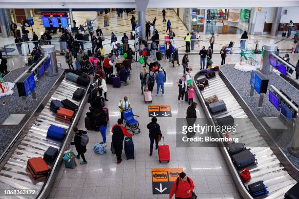 The baggage claim area at Hartsfield-Jackson Atlanta International Airport in Atlanta, Georgia, US, on Friday, Dec. 22, 2023. An estimated 112.7...