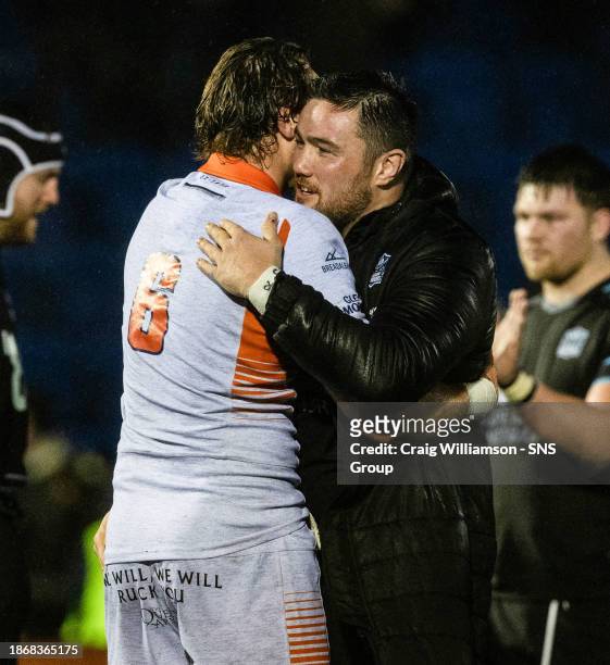 Edinburgh's Jamie Ritchie and Warriors' Zander Fagerson at full time during a BKT United Rugby Championship match between Glasgow Warriors and...
