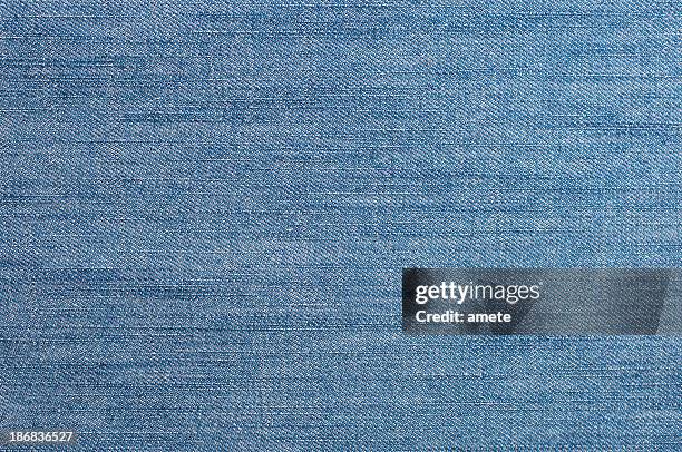 blue denim fabric - denim trousers stock pictures, royalty-free photos & images