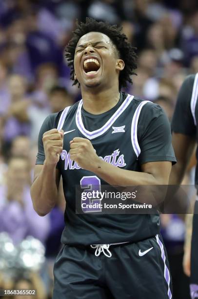 Kansas State Wildcats guard Tylor Perry yells to celebrate a basket late in the second half of a college basketball game between the Wichita State...