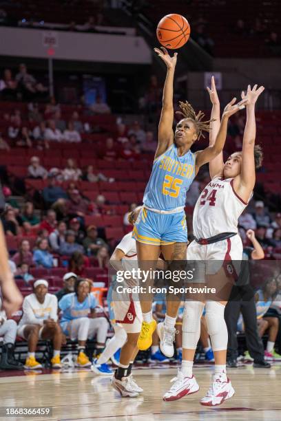 Southern University Jaguars guard Genovea Johnson lays the ball up for two points versus Oklahoma on December 22 at the Lloyd Noble Center in Norman,...
