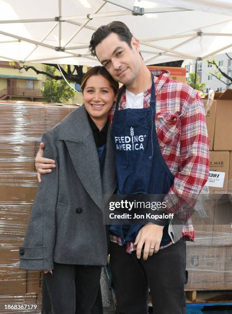 Ashley Tisdale and Christopher French volunteer as Feeding America hosts Holiday Volunteer Opportunity at North Valley Caring Services on December...