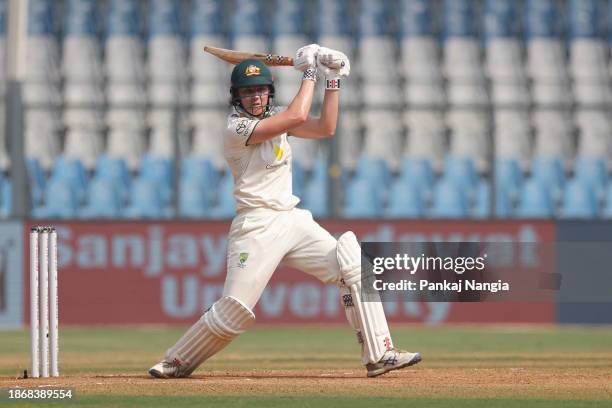 Tahlia McGrath of Australia plays a shot during day three of the Women's Test Match between India and Australia at Wankhede Stadium on December 23,...