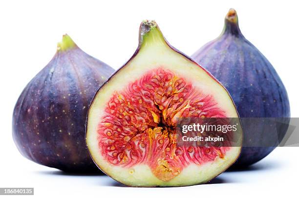 a set of figs one has been sliced - fig stock pictures, royalty-free photos & images