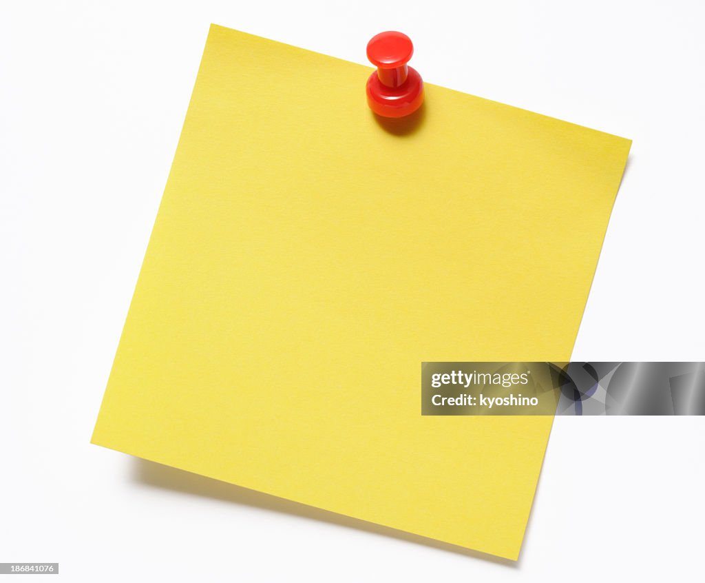 Isolated shot of blank yellow sticky note with red thumbtack