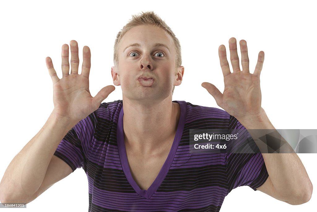 Man pressing face against glass