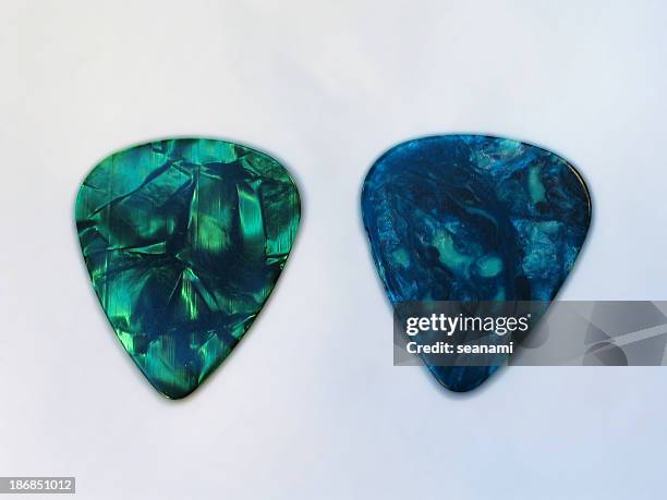 two guitar picks - gitaarplectrum stockfoto's en -beelden