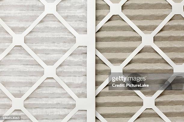 clean and dirty air filters, side-by-side - air purifier stock pictures, royalty-free photos & images