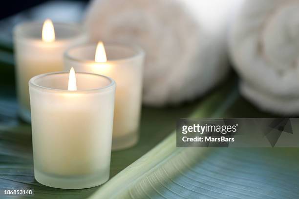candles at the spa - candle stockfoto's en -beelden