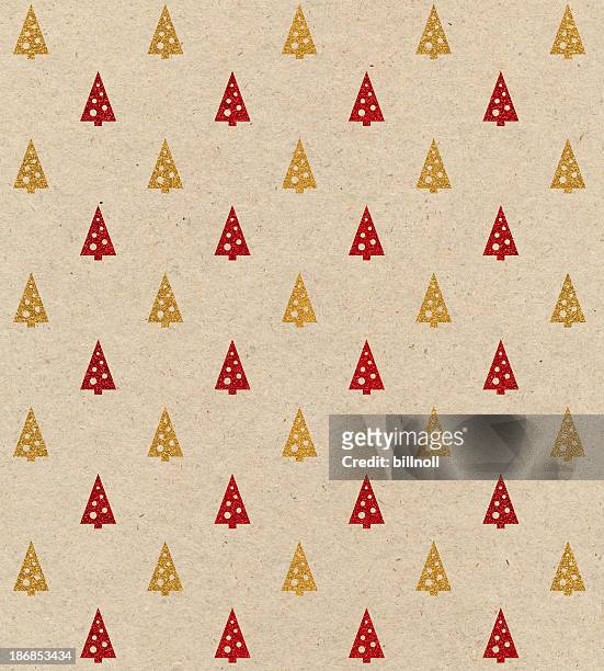 brown paper with christmas tree design - christmas paper stockfoto's en -beelden