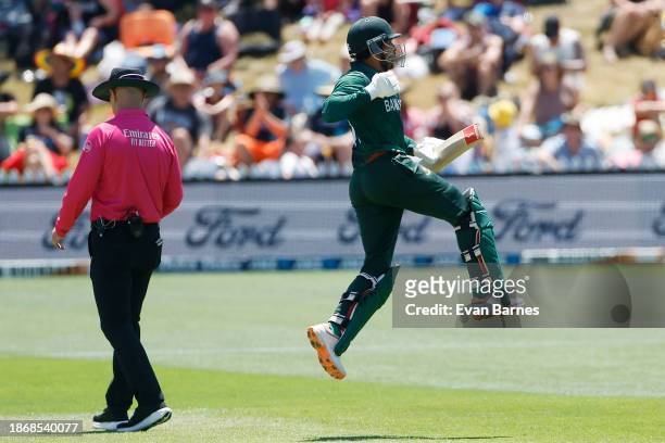 Soumya Sarkar of Bangladesh celebrates scoring a century during game two of the Men's ODI series between New Zealand and Bangladesh at Saxton Field...