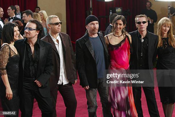 Rock band U2 attend the 75th Annual Academy Awards at the Kodak Theater on March 23, 2003 in Hollywood, California. Bono and wife Alison Stewart,...